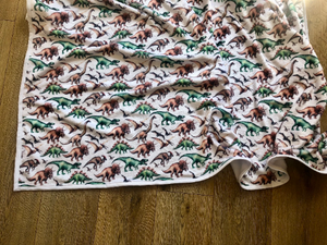 Handmade dinosaur fleece blanket